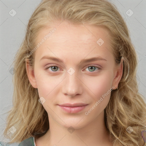 Joyful white young-adult female with long  brown hair and blue eyes