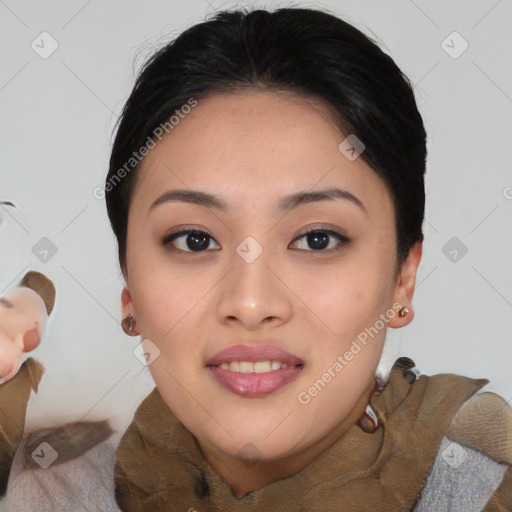 Joyful asian young-adult female with medium  black hair and brown eyes