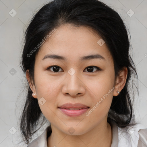 Joyful asian young-adult female with medium  brown hair and brown eyes