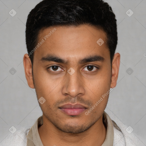 Neutral latino young-adult male with short  black hair and brown eyes