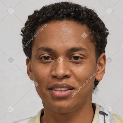 Joyful black young-adult male with short  brown hair and brown eyes