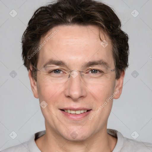 Joyful white adult male with short  brown hair and grey eyes