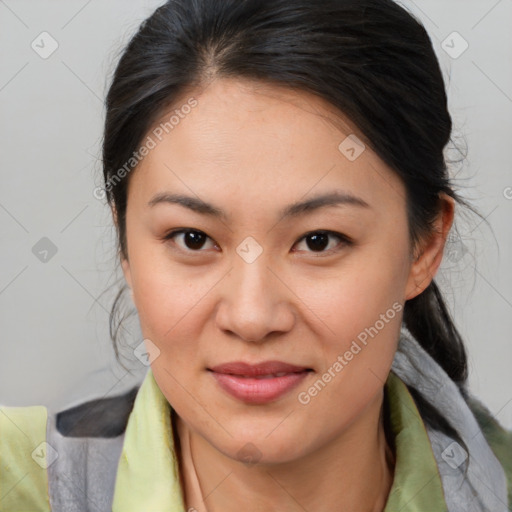 Joyful asian young-adult female with medium  brown hair and brown eyes