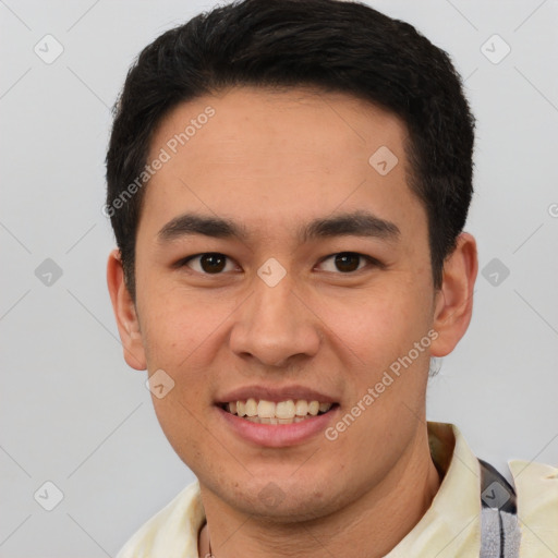 Joyful white young-adult male with short  black hair and brown eyes