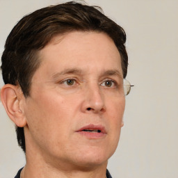 Neutral white adult male with short  brown hair and brown eyes