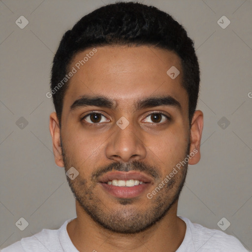 Joyful black young-adult male with short  black hair and brown eyes