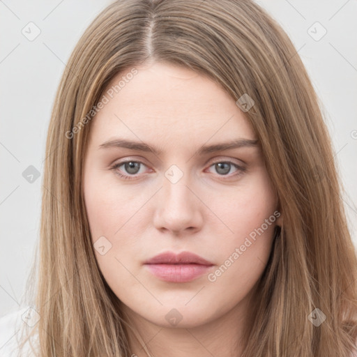 Neutral white young-adult female with long  brown hair and brown eyes