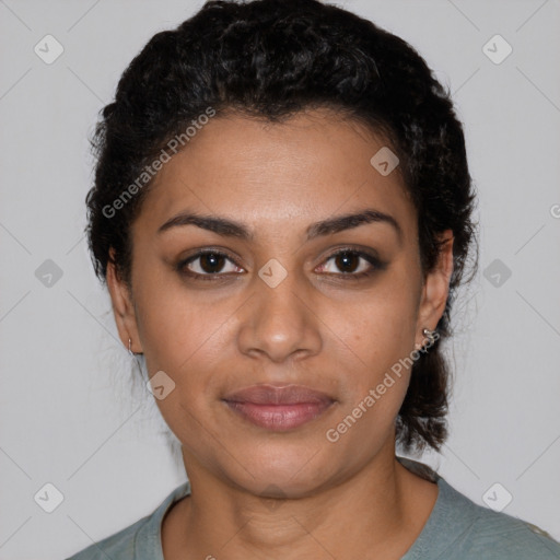 Joyful latino young-adult female with short  black hair and brown eyes