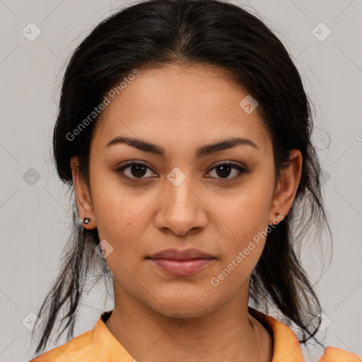 Joyful latino young-adult female with medium  brown hair and brown eyes