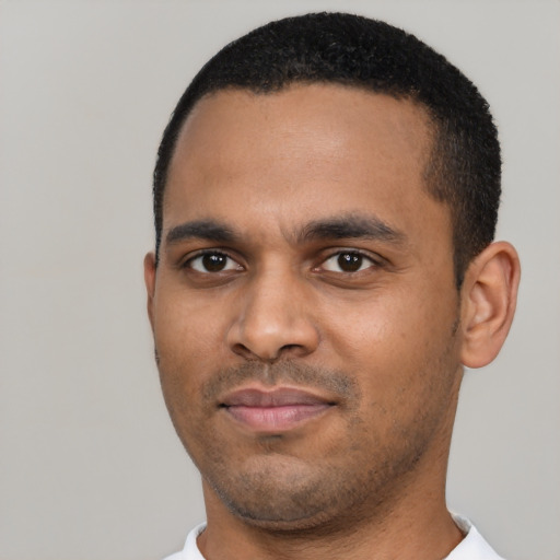 Neutral black young-adult male with short  black hair and brown eyes