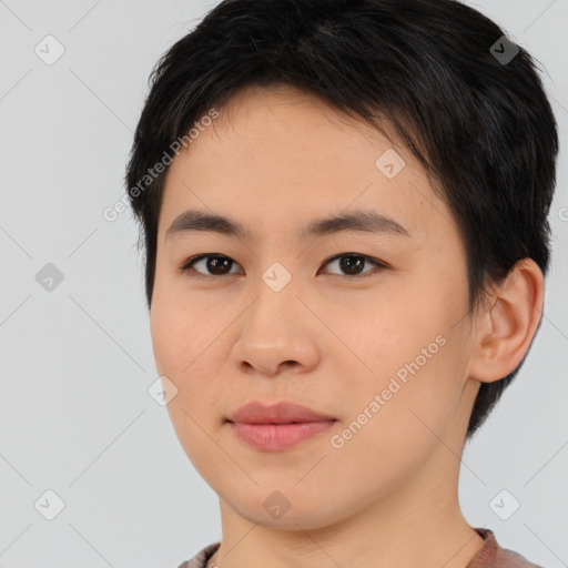 Joyful asian young-adult female with short  black hair and brown eyes