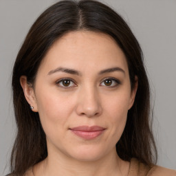 Joyful white young-adult female with medium  brown hair and brown eyes