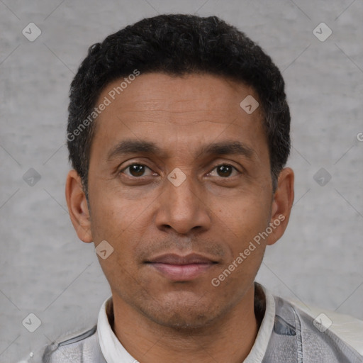 Neutral latino adult male with short  black hair and brown eyes