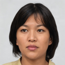 Neutral asian young-adult female with medium  brown hair and brown eyes