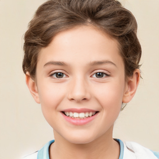 Joyful white child female with short  brown hair and brown eyes