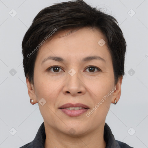 Joyful white adult female with short  brown hair and brown eyes