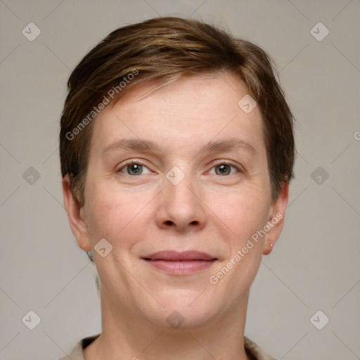 Joyful white young-adult female with short  brown hair and grey eyes