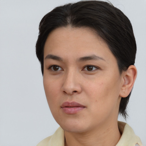 Neutral white young-adult female with short  brown hair and brown eyes