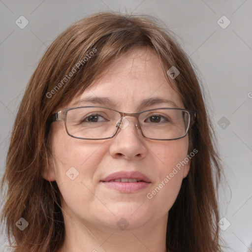 Joyful white adult female with medium  brown hair and brown eyes