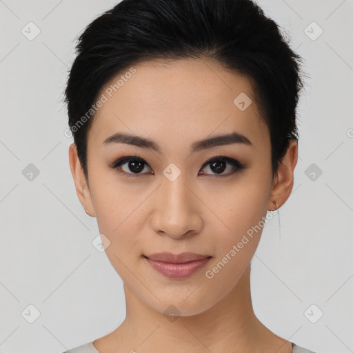 Joyful asian young-adult female with short  black hair and brown eyes