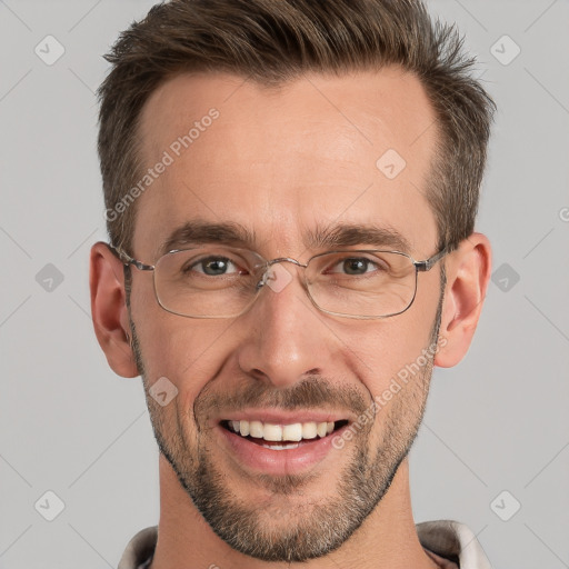 Joyful white adult male with short  brown hair and grey eyes