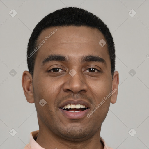 Joyful black young-adult male with short  black hair and brown eyes