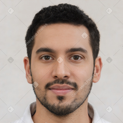 Neutral latino young-adult male with short  black hair and brown eyes