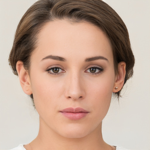 Neutral white young-adult female with short  brown hair and brown eyes