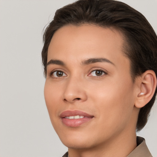 Joyful white young-adult female with short  brown hair and brown eyes