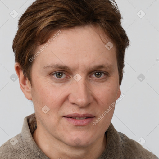 Joyful white adult female with short  brown hair and grey eyes