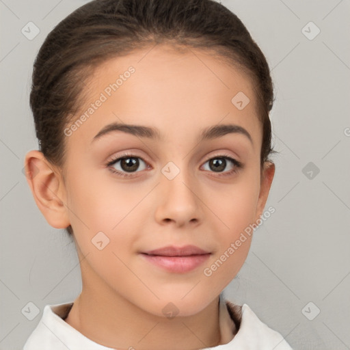 Joyful white child female with short  brown hair and brown eyes