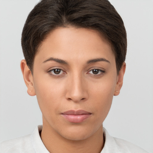 Neutral white young-adult female with short  brown hair and brown eyes