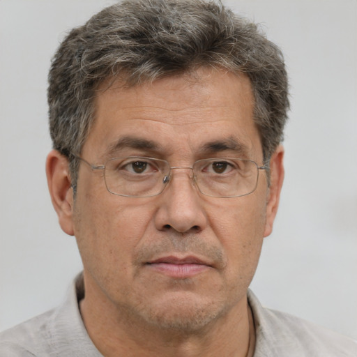 Neutral white middle-aged male with short  brown hair and brown eyes