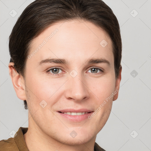 Joyful white young-adult female with short  brown hair and grey eyes