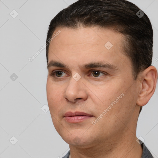 Joyful white young-adult male with short  brown hair and brown eyes