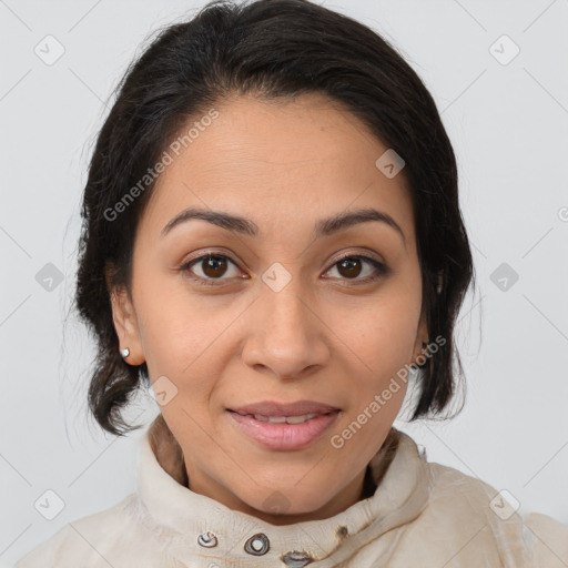 Joyful latino young-adult female with medium  brown hair and brown eyes