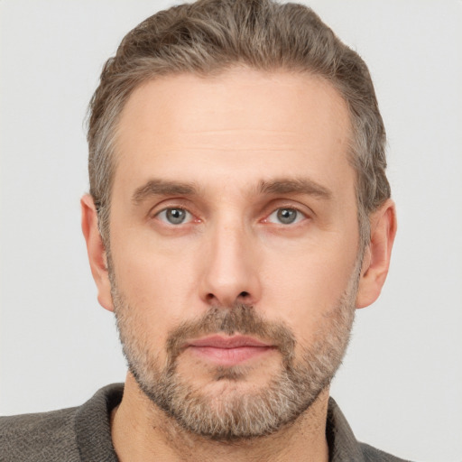 Neutral white adult male with short  brown hair and brown eyes