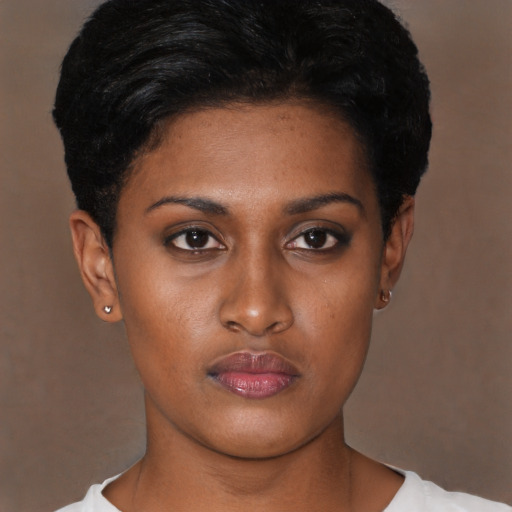 Neutral black young-adult female with short  black hair and brown eyes