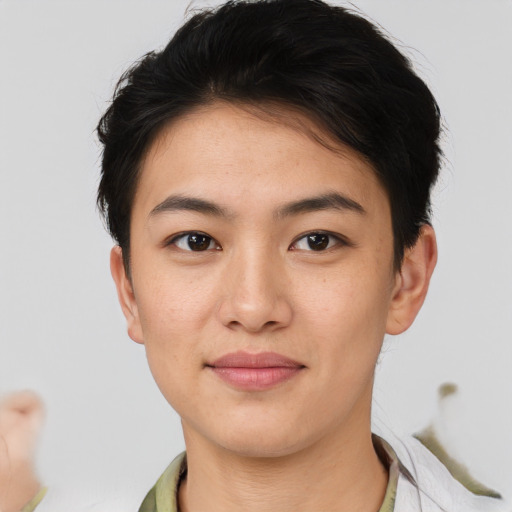 Joyful asian young-adult female with short  brown hair and brown eyes