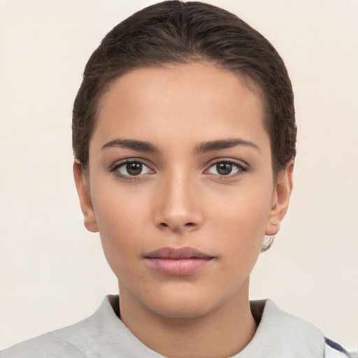 Neutral white young-adult female with short  brown hair and brown eyes