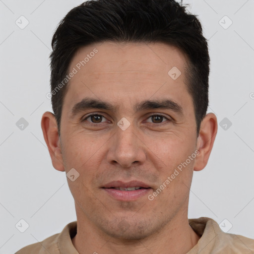 Joyful white adult male with short  brown hair and brown eyes