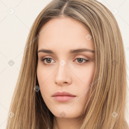 Neutral white young-adult female with long  brown hair and brown eyes