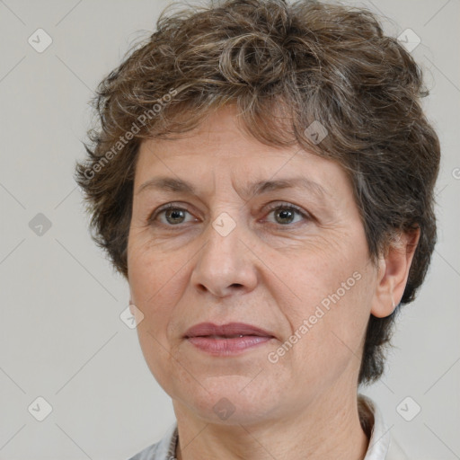 Joyful white middle-aged female with short  brown hair and brown eyes