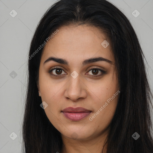 Joyful latino young-adult female with long  brown hair and brown eyes