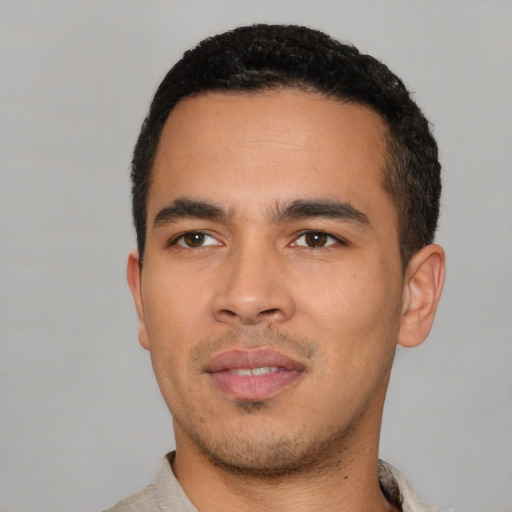 Neutral latino young-adult male with short  black hair and brown eyes