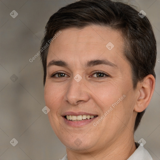 Joyful white adult female with short  brown hair and brown eyes