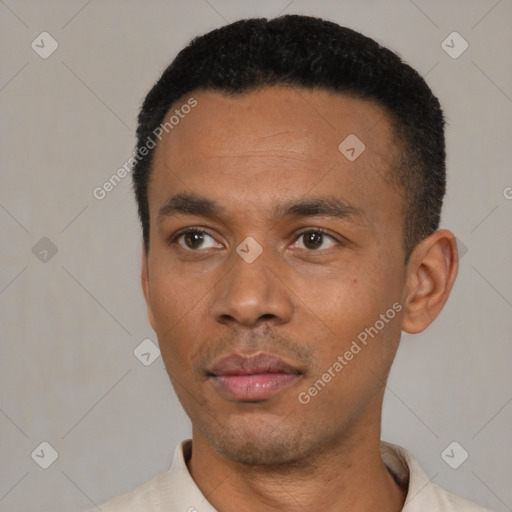 Neutral latino young-adult male with short  black hair and brown eyes