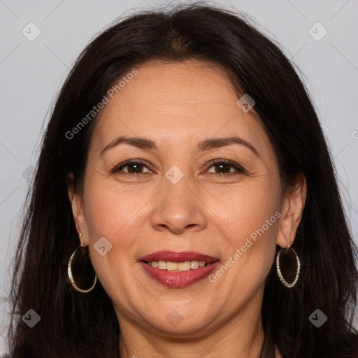 Joyful white adult female with long  brown hair and brown eyes