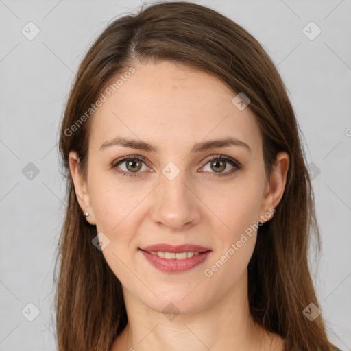 Joyful white young-adult female with long  brown hair and grey eyes