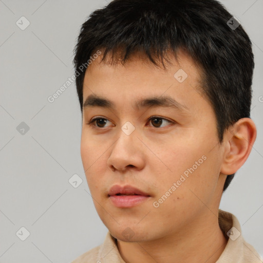 Neutral asian young-adult male with short  black hair and brown eyes